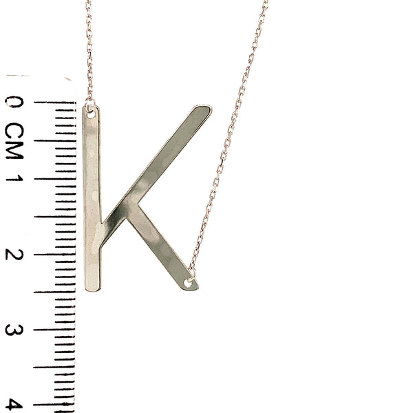 Collar con inicial (K) en oro blanco 10kt. 42-45cm