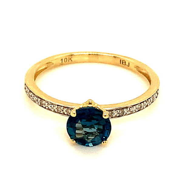 Anillo de Topacio Azul en oro amarillo 10kt. ANTES: $349.00