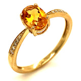 Anillo de citrino con diamante en oro amarillo 10kt.