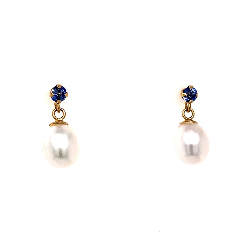 Aretes de perlas con tanzanita en oro amarillo 14KT.