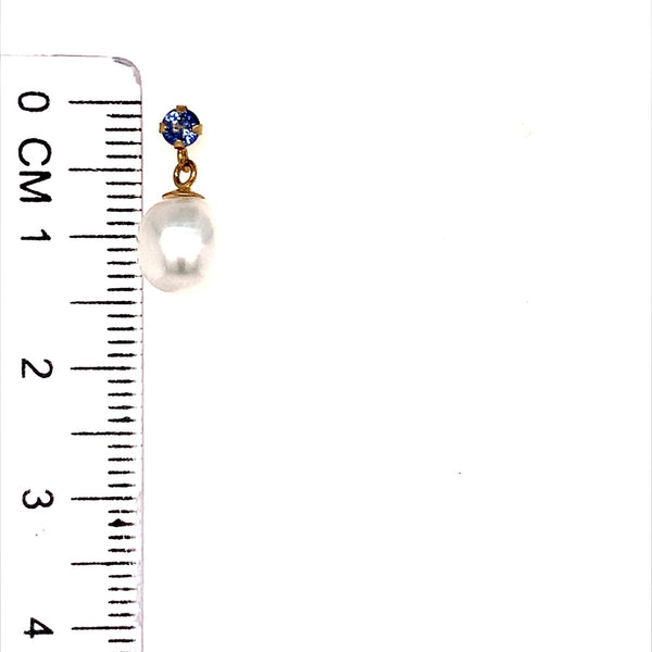Aretes de perlas con tanzanita en oro amarillo 14KT.