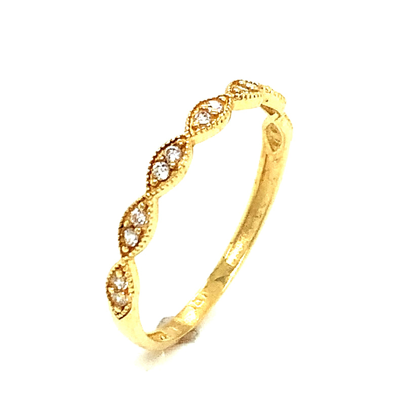 Banda con circones en oro amarillo 18k