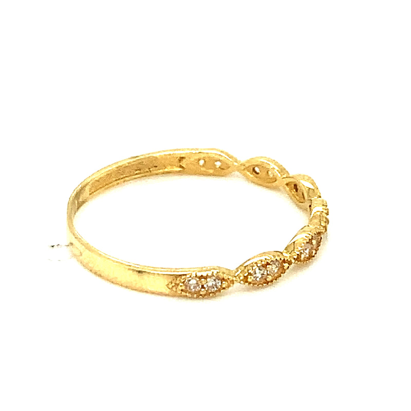 Banda con circones en oro amarillo 18k