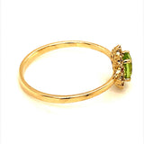 Anillo con peridoto y diamantes en oro amarillo 10KT