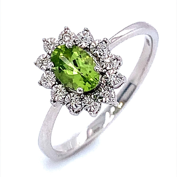 Anillo de Peridoto en oro blanco 10kt.  ANTES:  $349.00