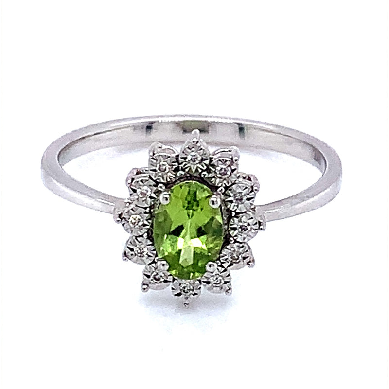 Anillo de Peridoto en oro blanco 10kt.  ANTES:  $349.00