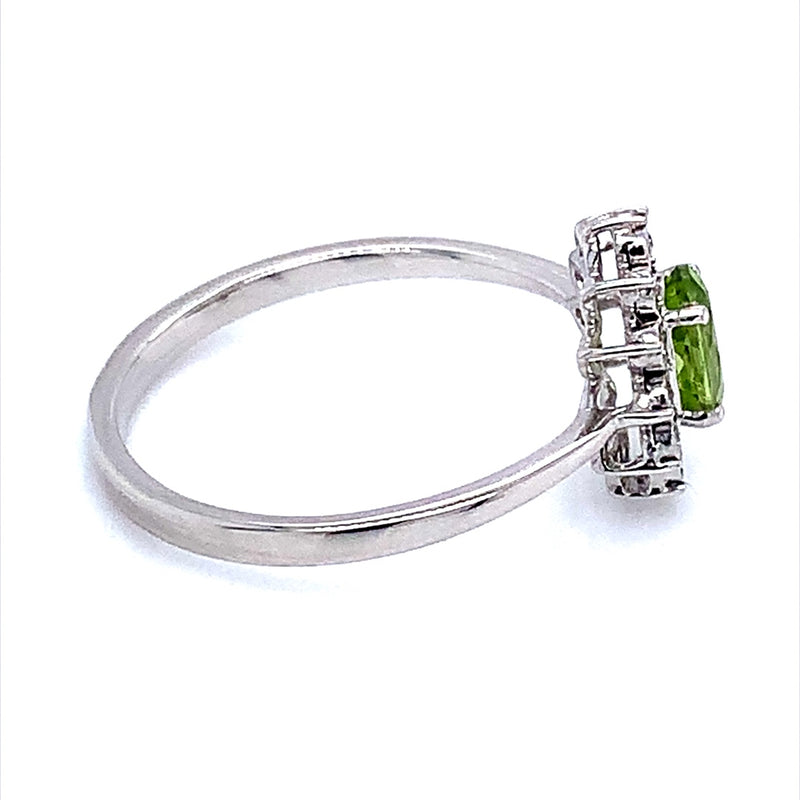 Anillo de Peridoto en oro blanco 10kt.  ANTES:  $349.00