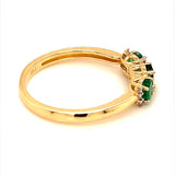 Anillo de esmeralda con diamantes en oro amarillo 10kt.