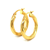 Argollas en oro amarillo 18kt