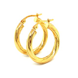 Argollas en oro amarillo 18kt