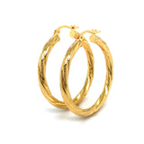 Argollas en oro amarillo 18kt
