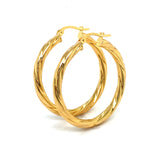 Argollas en oro amarillo 18kt