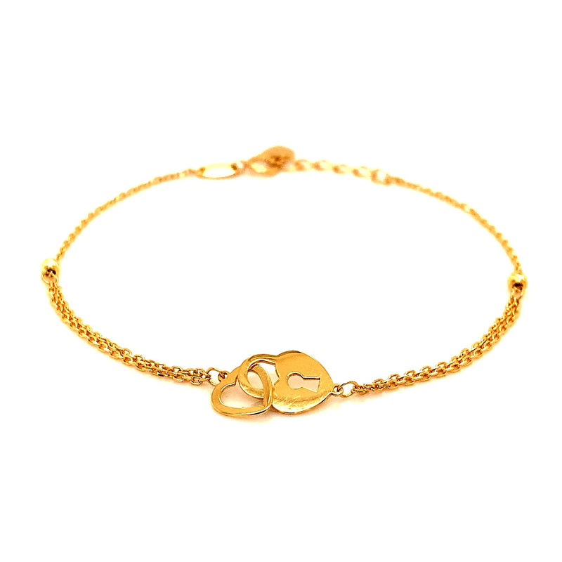 Pulsera (corazón y candado) en oro amarillo 18k. 17-19cm