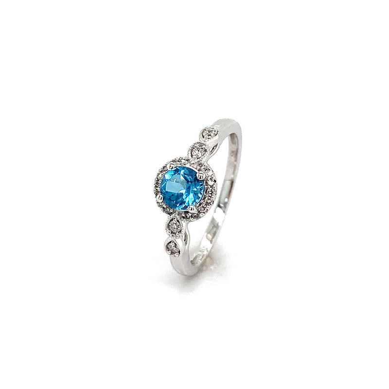 Anillo de Topacio Azul con diamantes en oro blanco 10kt.