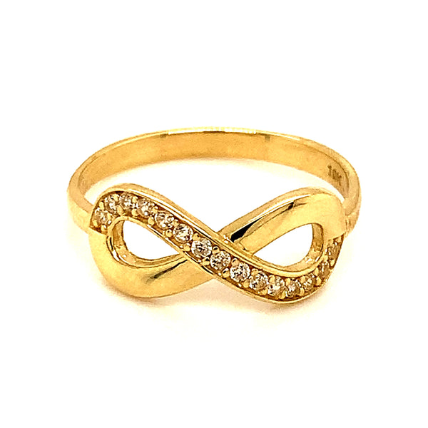 Anillo (infinito) con circones en oro amarillo 10k