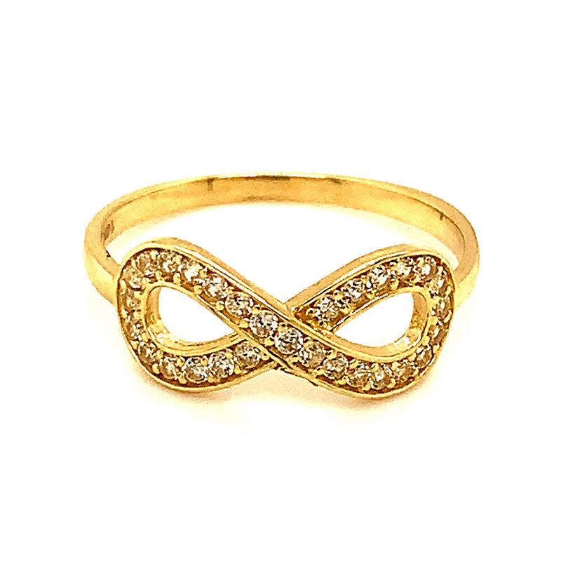 Anillo (infinito) con circones en oro amarillo 10k