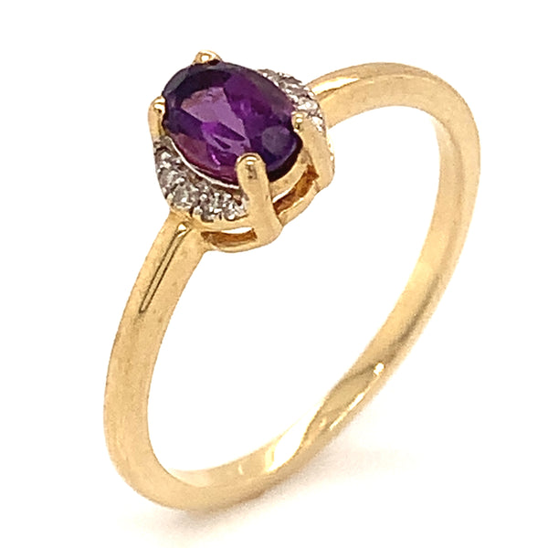 Anillo de amatista con diamantes en oro amarillo 10kt.