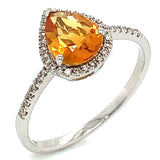 Anillo de citrino con diamantes en oro blanco 10kt.