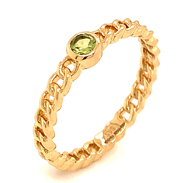 Anillo de peridoto en oro amarillo 14kt.