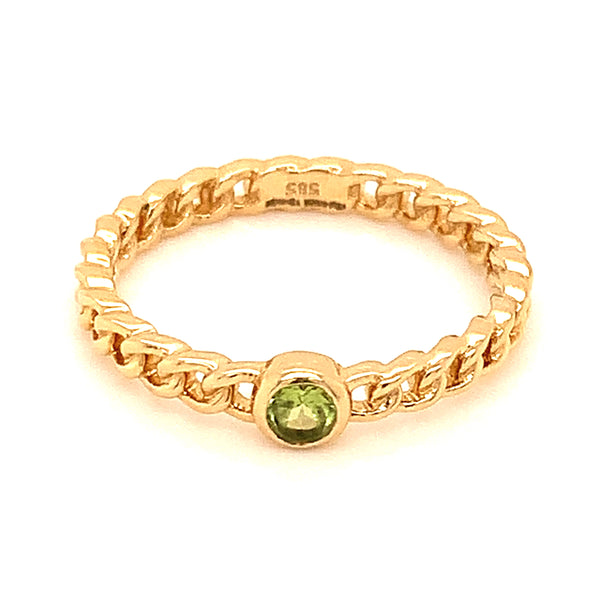 Anillo de peridoto en oro amarillo 14kt.