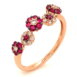 Anillo de rubíes con diamantes en oro rosado 14kt.