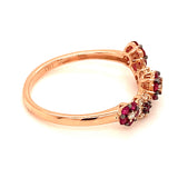 Anillo de rubíes con diamantes en oro rosado 14kt.