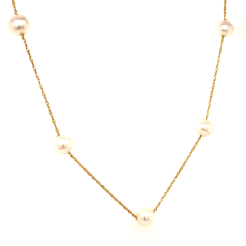 Collar de perlas en oro amarillo 14kt. 68CM