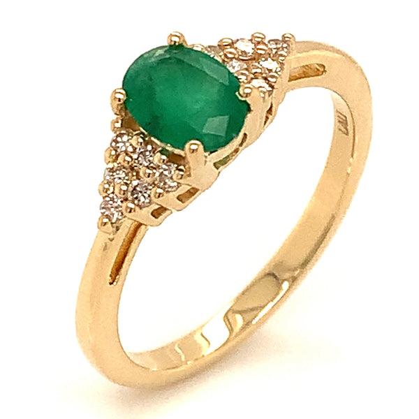 Anillo con esmeralda en oro amarillo 14kt.