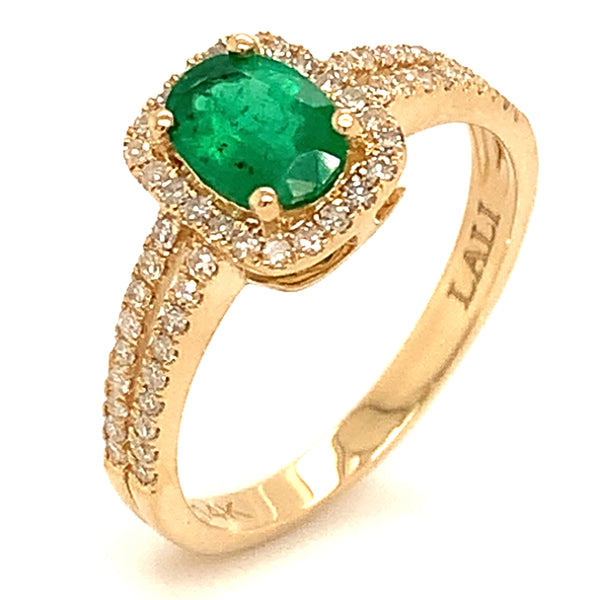 Anillo con esmeraldas en oro amarillo 14kt.