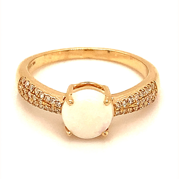 Anillo de ópalo con diamantes en oro amarillo 14kt.