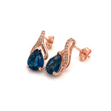 Aretes de topacio azul en oro rosado 14kt ANTES: $399.00