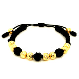 Pulsera (hilo negro ajustable) en amarillo 18k.