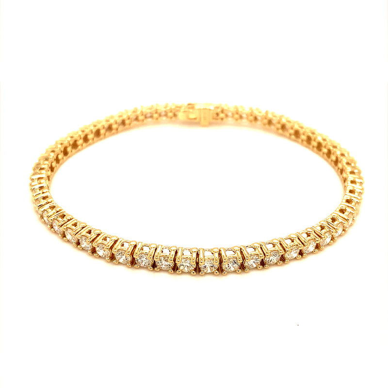 (LD) Pulsera (tennis) con diamantes de laboratorio en oro amarillo 14kt.