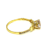 Anillo con circones en oro amarillo 10kt. - DGjoyeros