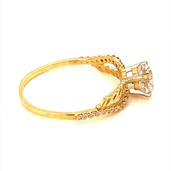 Anillo con circones en oro amarillo 10kt. - DGjoyeros