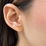 Aretes con circones en oro amarillo 14kt. (Noviembre)