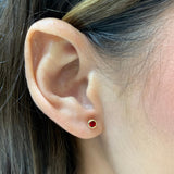 Aretes con circones en oro amarillo 14kt. (Enero)
