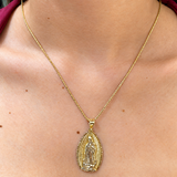 Dije (Vírgen de Guadalupe) en oro amarillo 10kt.