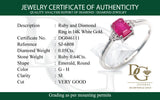 Anillo de rubí con diamantes en oro blanco 14kt. R-0.64CTS. D-0.05CTS.
