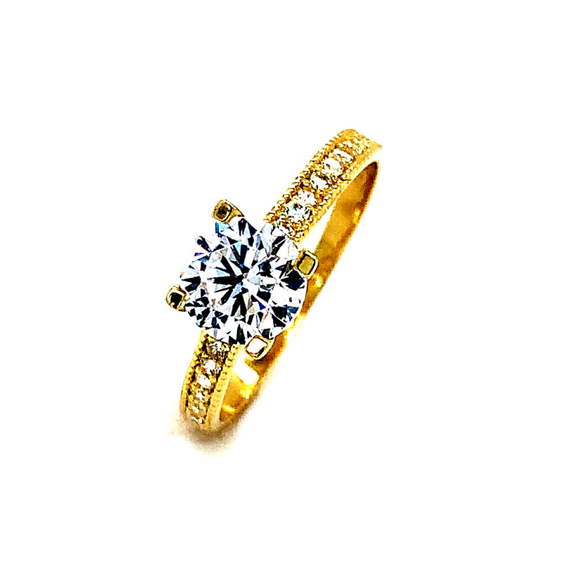 Anillo con circones en oro amarillo 10kt.