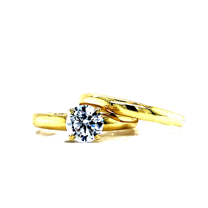 Set de anillos de matrimonio con circones en oro amarillo 10kt