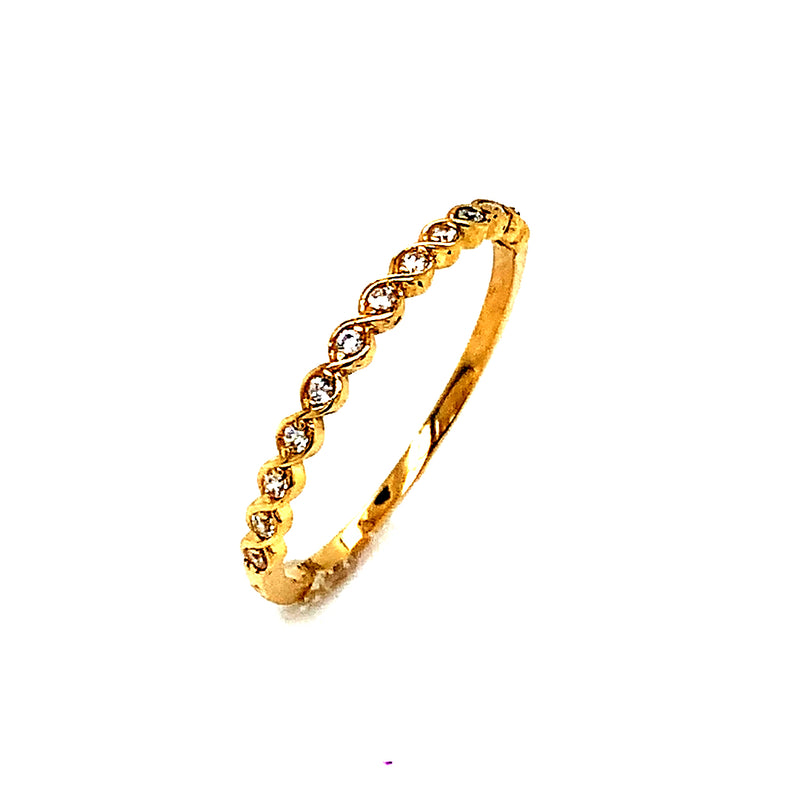 Banda con circones en oro amarillo 18k