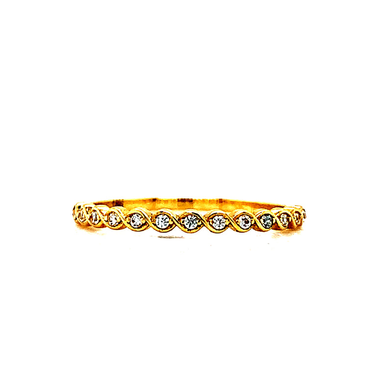 Banda con circones en oro amarillo 18k