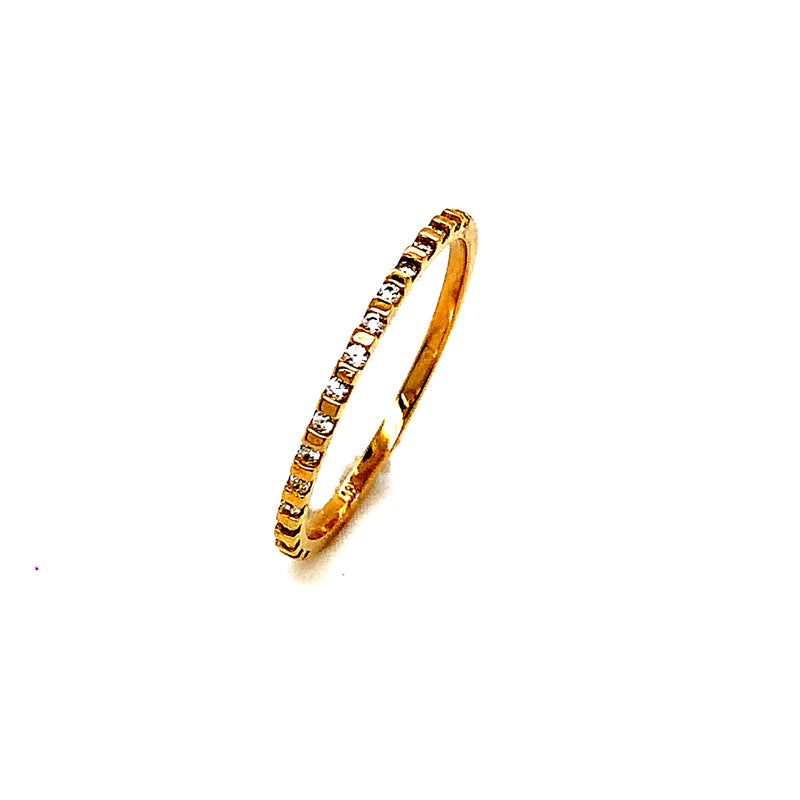 Banda con circones en oro amarillo 18k