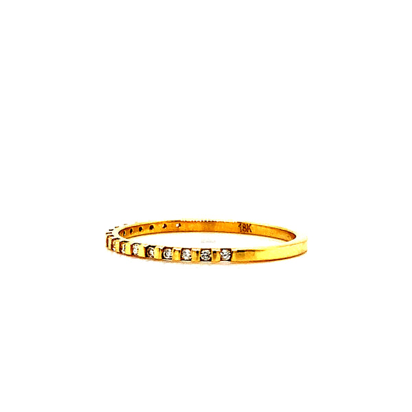 Banda con circones en oro amarillo 18k