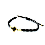 Pulsera (trébol onix negro con cordón ajustable) en amarillo 10k