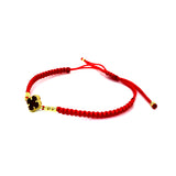 Pulsera (trébol onix negro con cordón ajustable) en amarillo 10k