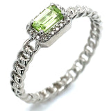 Anillo de Peridoto con diamantes en oro blanco 14k.