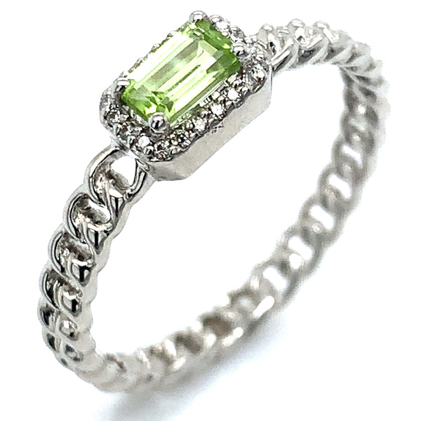 Anillo de Peridoto con diamantes en oro blanco 14k.