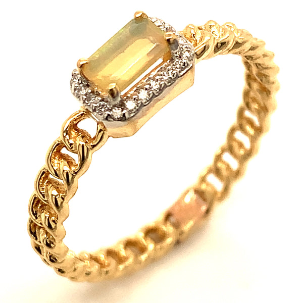 Anillo de Ópalo con diamantes en oro amarillo 14k.
